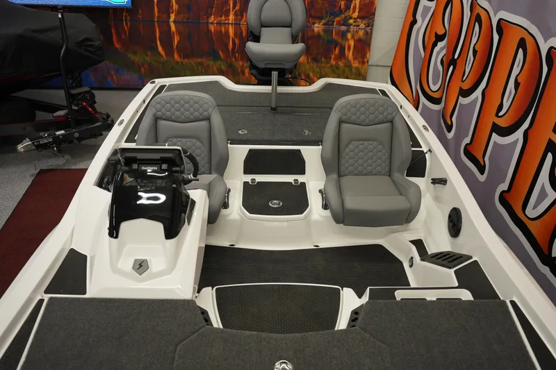 Slide: The Image of 2026 iKon VLE21 boat interior with gray seating and modern dashboard. - 10