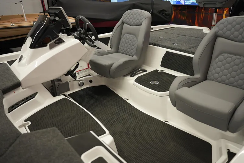 Slide: The Image of Interior of 2026 iKon VLE21 boat with gray seats and modern dashboard. - 23