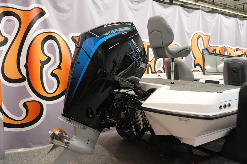 Slide: The Image of iKon VLE21 2026 boat with Mercury Pro XS engine displayed indoors. - 3