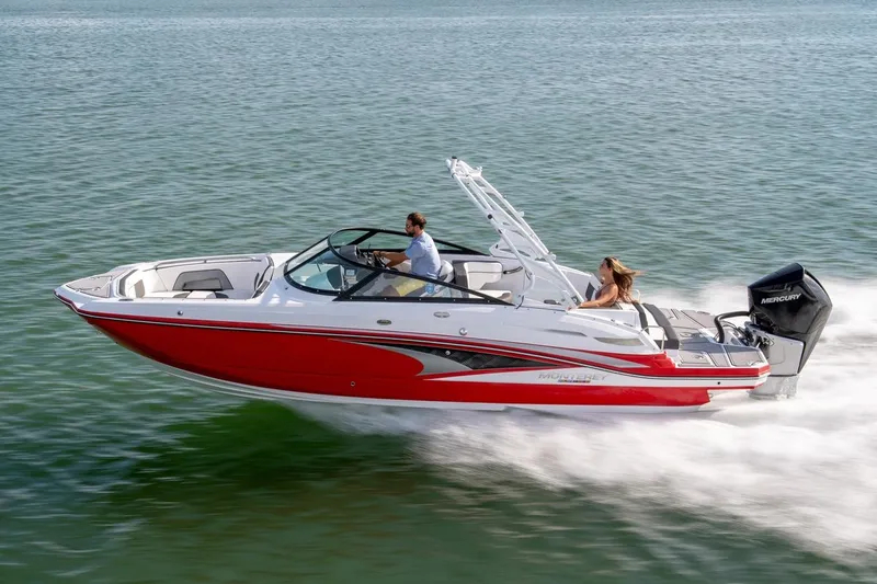 The Image of Manufacturer Provided Image: 2026 Monterey M-65 boat cruising on water, featuring sleek red and white design. - 0