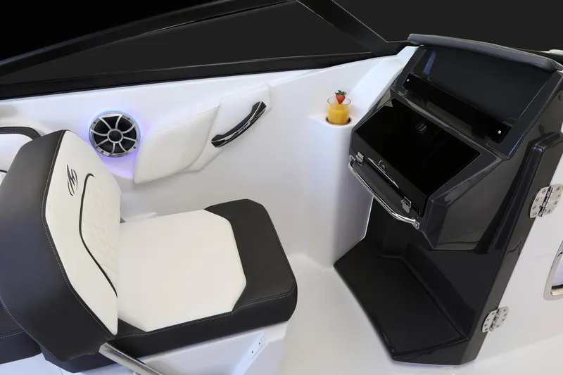 Slide: The Image of Manufacturer Provided Image: Interior of 2026 Monterey M-65 boat with seating and storage compartment. - 7