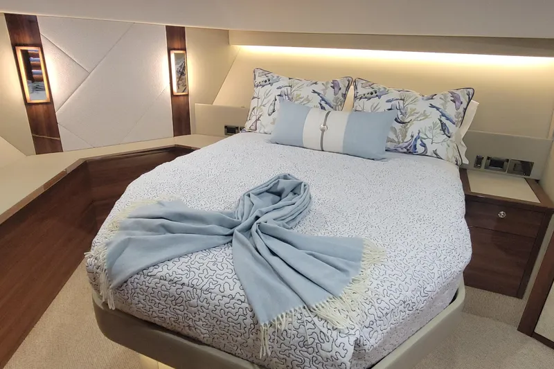Slide: The Image of Luxurious bedroom interior of 2025 Maritimo M55 yacht with modern design. - 24