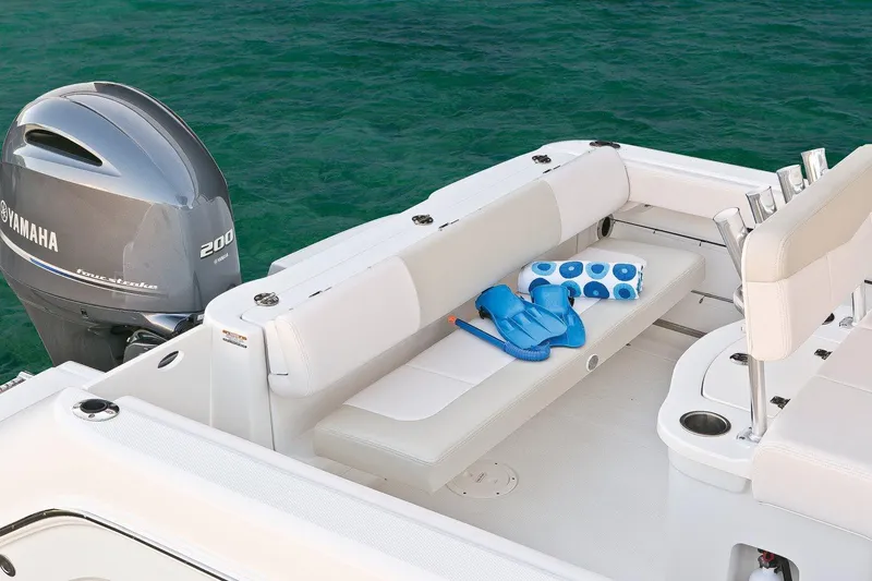 Slide: The Image of Manufacturer Provided Image: 2018 Robalo R222 Center Console boat with Yamaha 200 engine, rear seating area. - 10