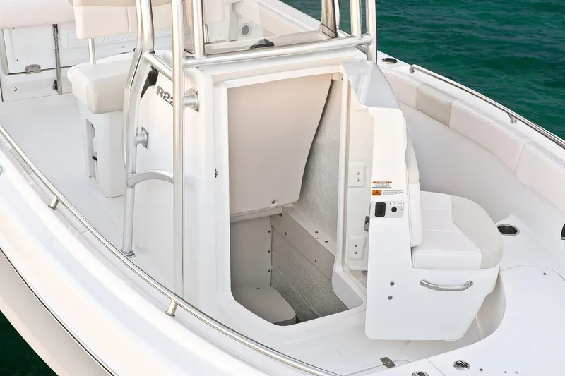 Slide: The Image of Manufacturer Provided Image: 2018 Robalo R222 Center Console boat interior with open storage compartment. - 6
