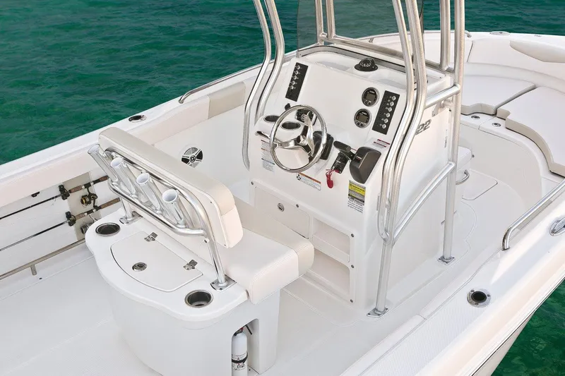 Slide: The Image of Manufacturer Provided Image: 2018 Robalo R222 Center Console boat interior with steering wheel and seating. - 8