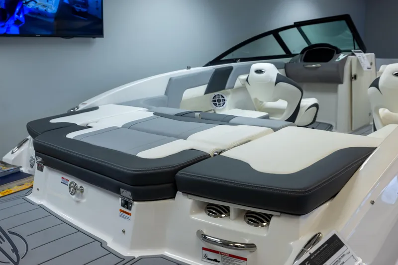 Slide: The Image of 2026 Chaparral 23 SSi boat interior with luxurious seating and modern design. - 16