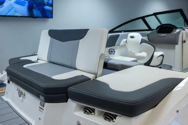 Slide: The Image of 2026 Chaparral 23 SSi boat interior with sleek seating and modern design. - 17