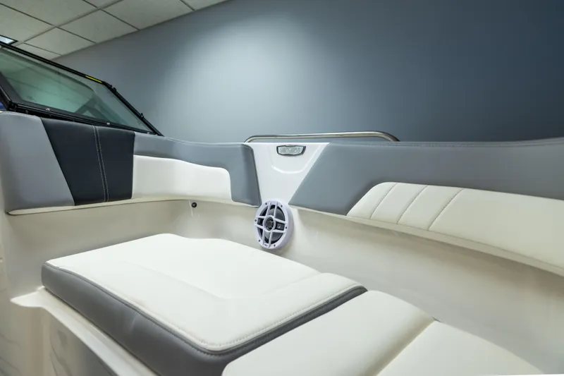 Slide: The Image of Interior of 2026 Chaparral 23 SSi boat, featuring sleek seating and modern design elements. - 21