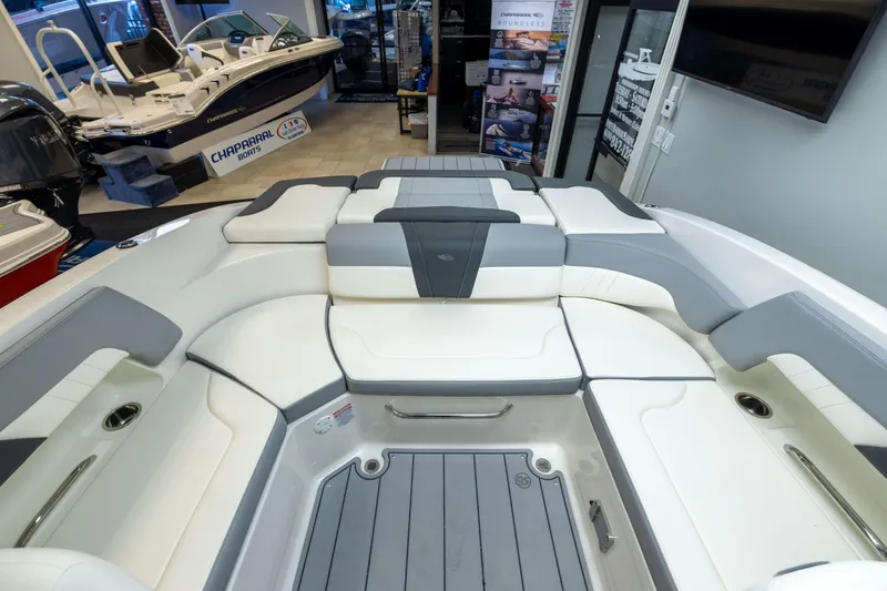 Slide: The Image of Interior view of 2026 Chaparral 23 SSi boat with luxurious seating. - 30