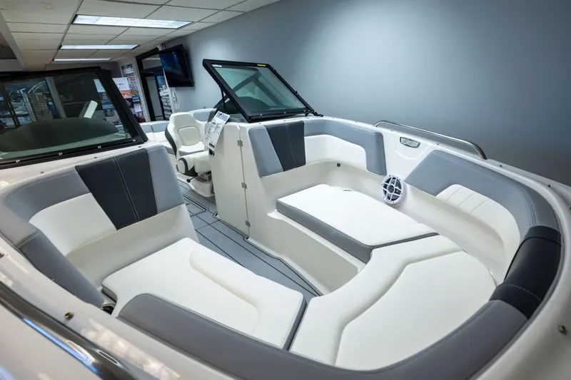 Slide: The Image of 2026 Chaparral 23 SSi boat interior with modern seating and sleek design. - 31