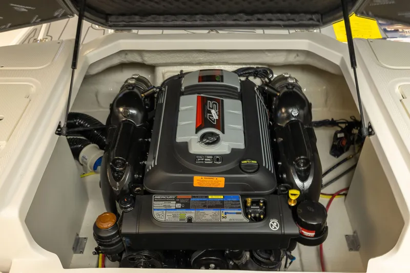 Slide: The Image of 2026 Chaparral 23 SSi boat engine compartment with Mercury 4.5L 250 HP engine. - 32