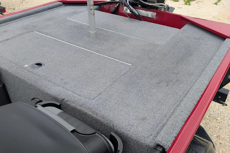 Slide: The Image of 2021 Tracker Bass Tracker Classic XL boat deck with gray carpet and storage compartments. - 7