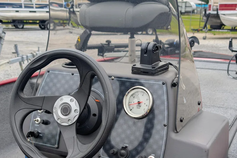 Slide: The Image of Steering console of 2021 Tracker Bass Tracker Classic XL boat with RPM gauge. - 8