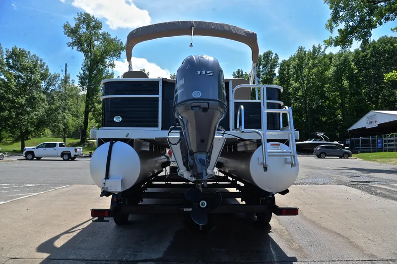 Slide: The Image of 2019 Bennington 22 pontoon boat with Yamaha 115 engine on trailer. - 13