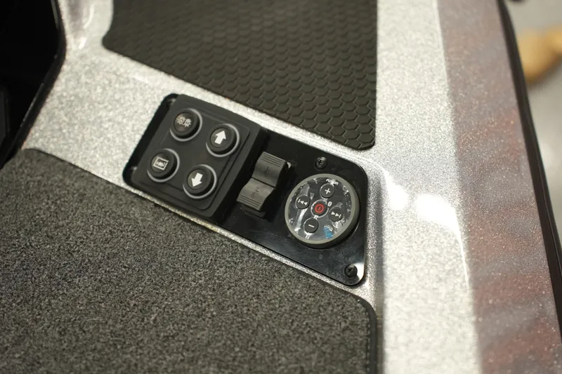 Slide: The Image of Control panel of 2026 iKon LXE20 with buttons and dials on textured surface. - 20