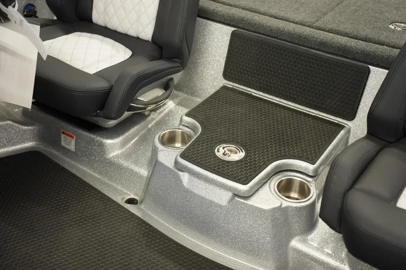 Slide: The Image of Interior of 2026 iKon LXE20 boat with cushioned seats and cup holders. - 24