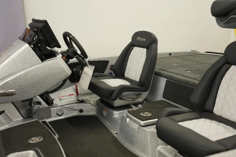 Slide: The Image of 2026 iKon LXE20 boat interior with sleek seats and modern dashboard design. - 5