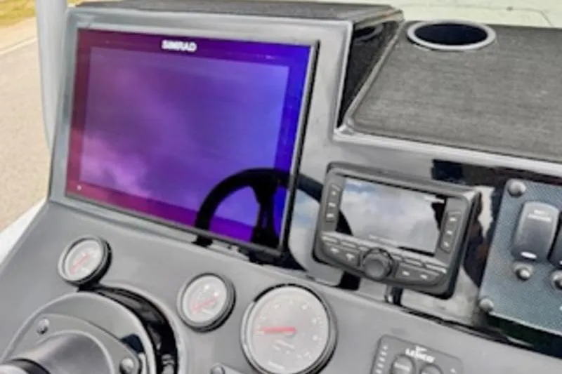 Slide: The Image of Dashboard of 2023 El Pescador 24 CAT boat with navigation and control instruments. - 14