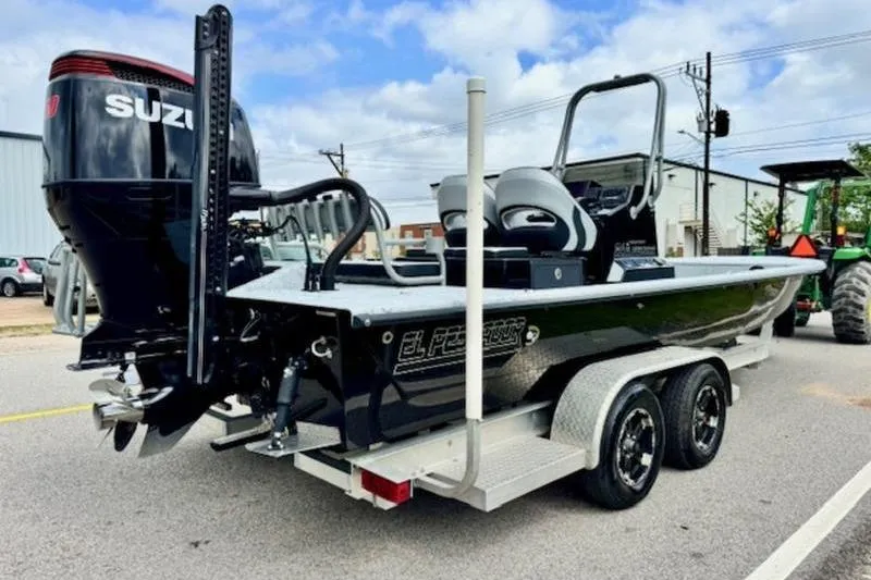 Slide: The Image of 2023 El Pescador 24 CAT boat on trailer with Suzuki outboard motor. - 4