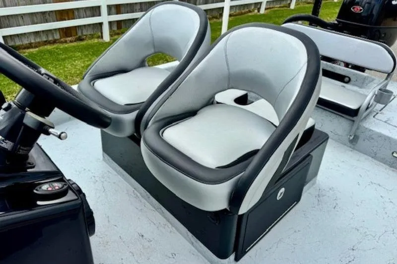Slide: The Image of Dual seats on 2023 El Pescador 24 CAT boat, featuring sleek design and comfortable cushioning. - 9