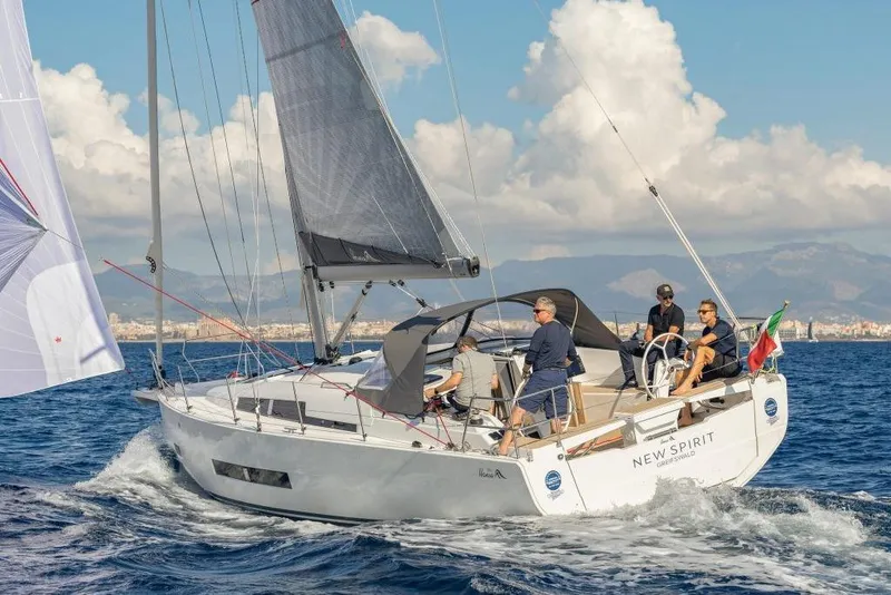 Slide: The Image of 2026 Hanse 360 sailboat cruising on open sea. - 13