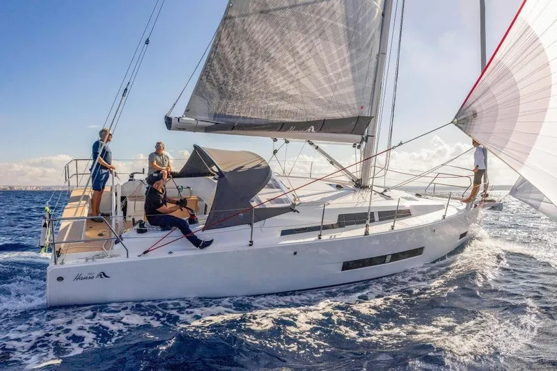 Slide: The Image of 2026 Hanse 360 sailboat navigating open waters. - 8