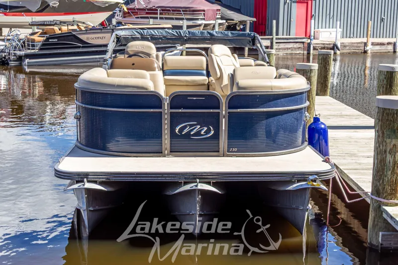 Slide: The Image of 2018 Manitou Aurora 23 LE RF VP pontoon boat docked at Lakeside Marina. - 3