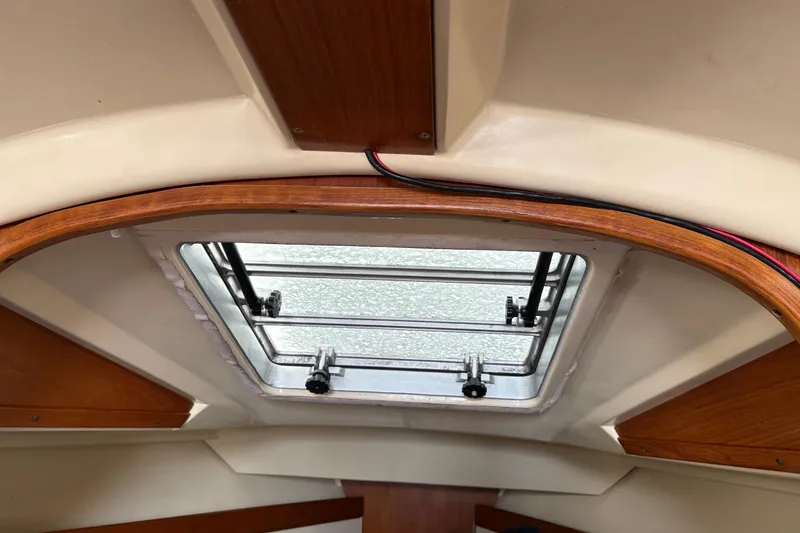 Slide: The Image of Two-burner stove in a 1988 Pearson 28 boat galley, with kitchen appliances nearby. - 30