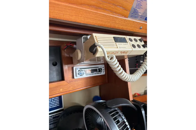 Slide: The Image of Interior cabin view of a 1988 Pearson 28 sailboat, featuring a window and hatch. - 37