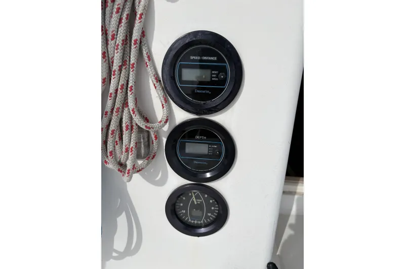 Slide: The Image of Cockpit of 1988 Pearson 28 sailboat with ropes and open hatch. - 6