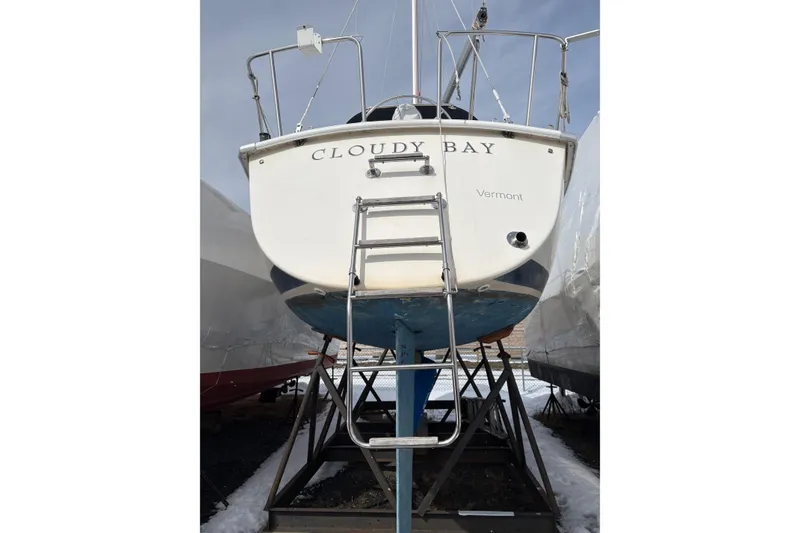 Slide: The Image of 1988 Pearson 28 sailboat "Cloudy Bay" on stands, rear view, Vermont. - 4