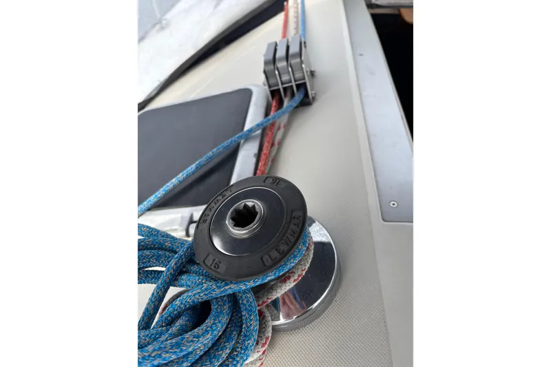 Slide: The Image of Winch and ropes on a 1988 Pearson 28 sailboat deck. - 9