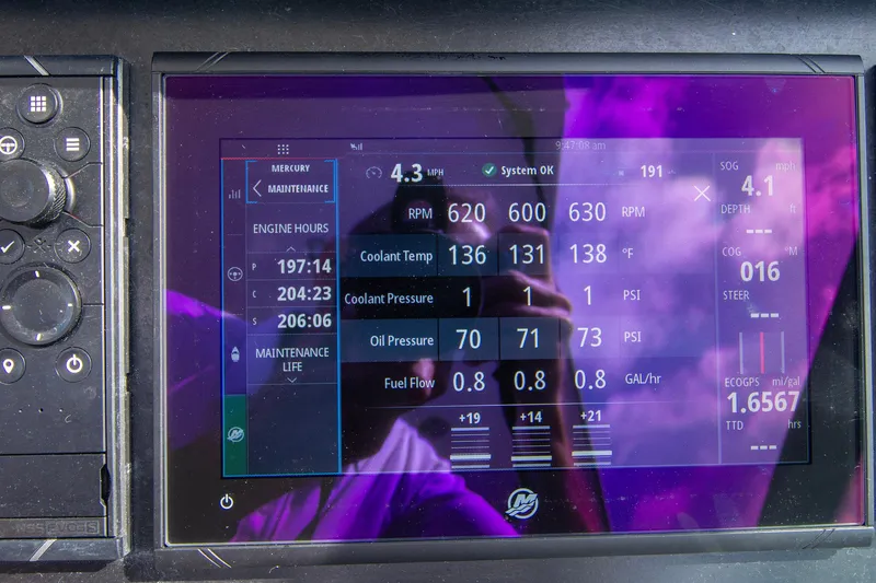 Slide: The Image of Dashboard display of a 2022 Monterey 385SS Super Sport boat showing engine metrics. - 13
