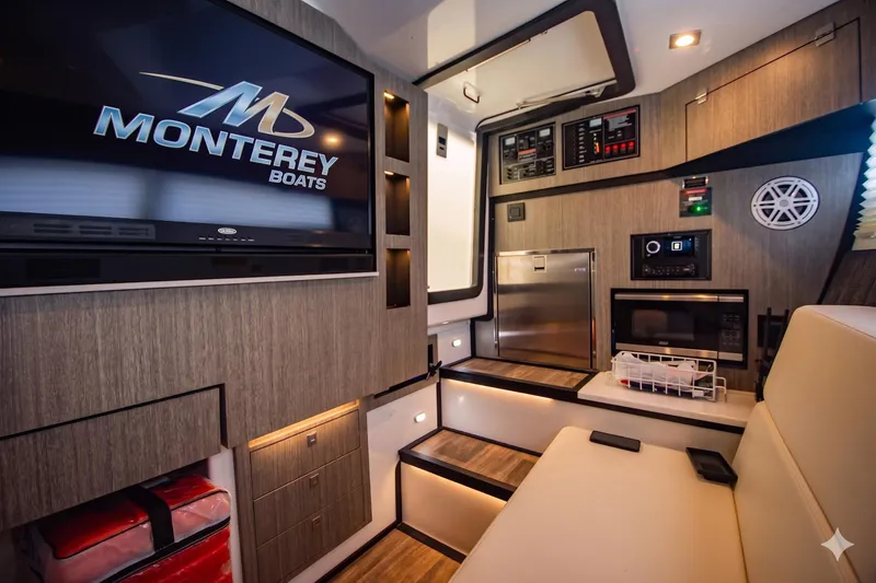 Slide: The Image of Luxurious interior of 2022 Monterey 385SS Super Sport boat with modern amenities. - 14