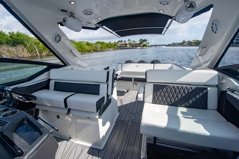 Slide: The Image of Luxurious interior of 2022 Monterey 385SS Super Sport boat on a scenic waterway. - 38