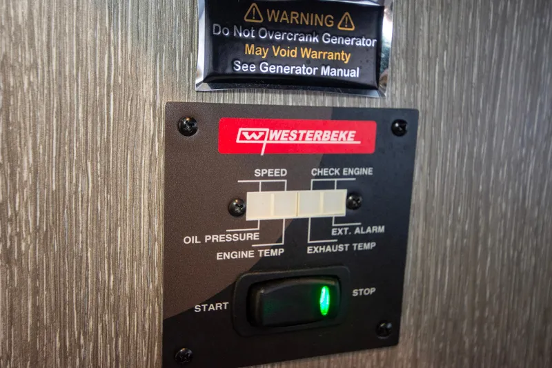 Slide: The Image of Control panel of a 2022 Monterey 385SS Super Sport generator with warning label. - 41
