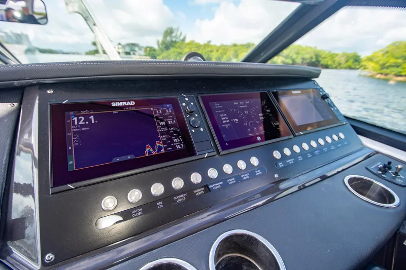Slide: The Image of Dashboard of 2022 Monterey 385SS Super Sport boat with navigation screens and controls. - 9