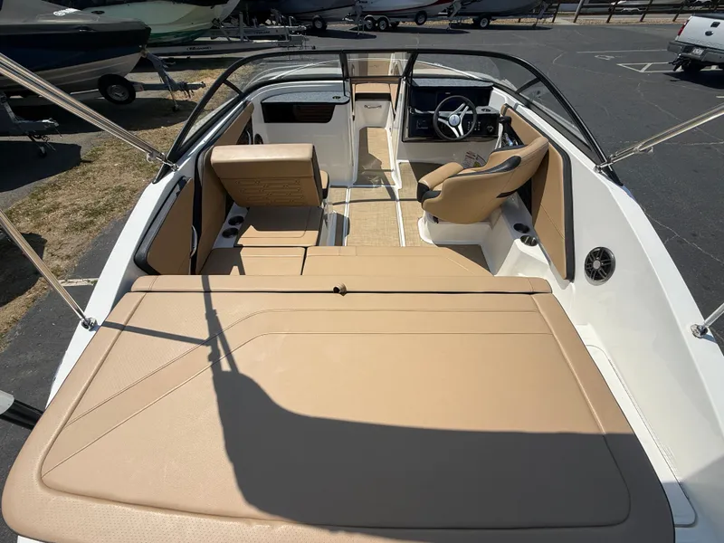 Slide: The Image of Interior of 2025 Sea Ray SPX 190 Outboard with beige seating. - 15