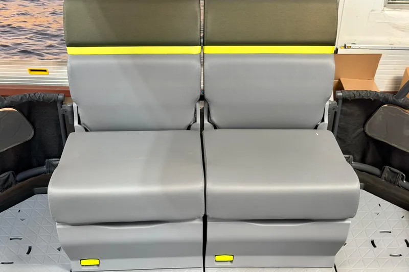 Slide: The Image of 2026 Sea-Doo Switch Fish 21 seating, featuring modern gray upholstery and yellow accents. - 17
