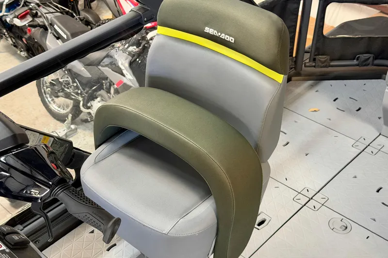 Slide: The Image of 2026 Sea-Doo Switch Fish 21 seat with steering controls, featuring modern design and comfort. - 18