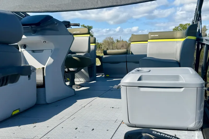 Slide: The Image of Interior of 2026 Sea-Doo Switch Fish 21 boat with seating and storage. - 3
