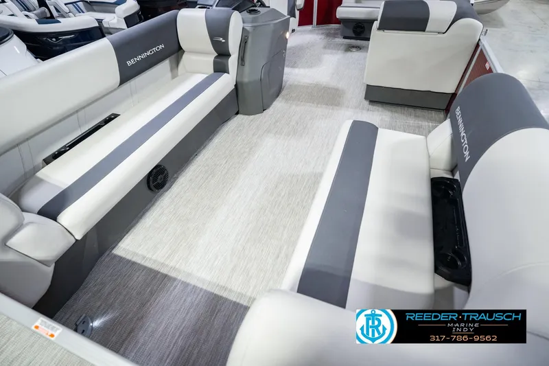 Slide: The Image of Interior of 2025 Bennington 20 SLS pontoon boat with plush seating and modern design. - 14