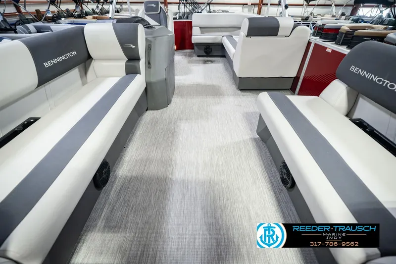 Slide: The Image of Interior of a 2025 Bennington 20 SLS pontoon boat with spacious seating. - 19