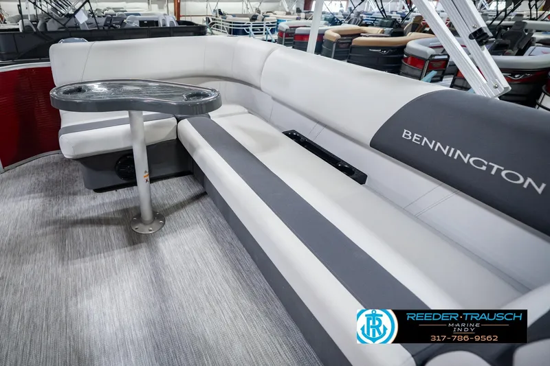 Slide: The Image of 2025 Bennington 20 SLS pontoon boat interior with gray seating and table. - 33