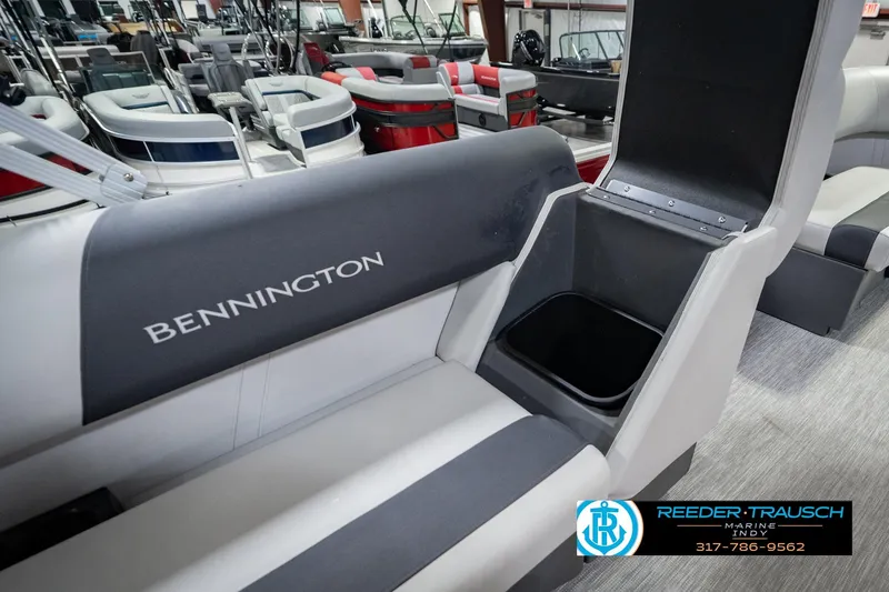 Slide: The Image of 2025 Bennington 20 SLS boat interior with storage compartment open. - 37