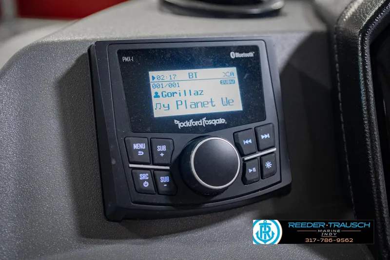 Slide: The Image of 2025 Bennington 20 SLS boat stereo system displaying song by Gorillaz. - 42