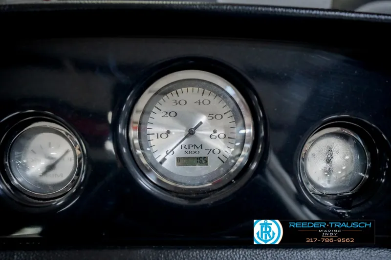 Slide: The Image of Dashboard gauges of a 2025 Bennington 20 SLS boat, featuring RPM indicator. - 43