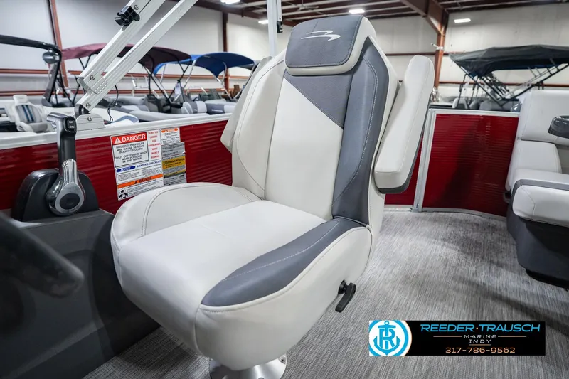 Slide: The Image of 2025 Bennington 20 SLS boat seat in showroom, featuring sleek design and comfortable upholstery. - 47
