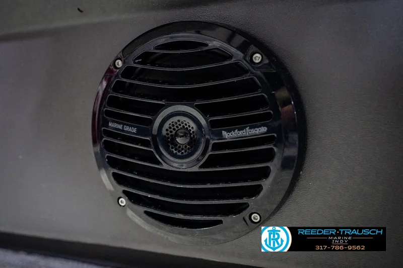 Slide: The Image of Marine-grade Rockford Fosgate speaker on 2025 Bennington 20 SLS boat, Reeder Trausch Marine logo. - 52