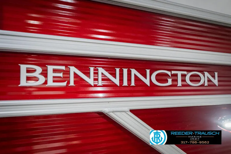 Slide: The Image of 2025 Bennington 20 SLS boat logo on vibrant red background. - 60